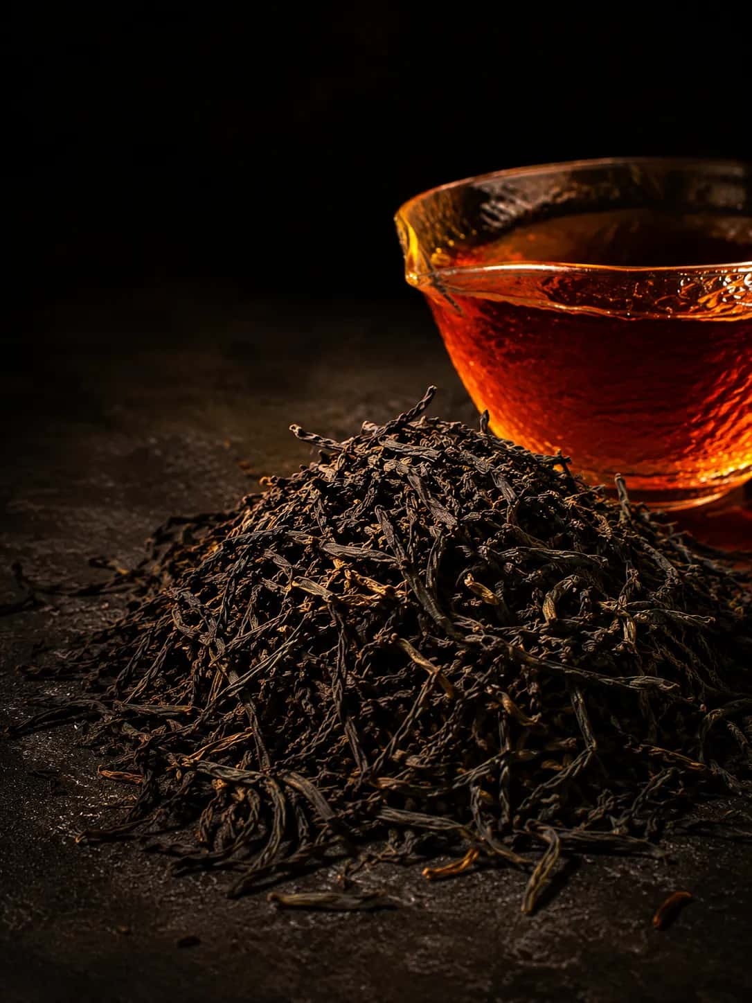 Low-Grown Wiry Black Loose Tea Leaves & Amber Brew