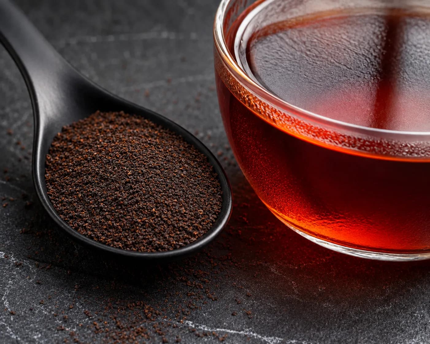 Ceylon BOPF (Broken Orange Pekoe Fannings) Tea Grade Ceylon BOPF Broken Orange Pekoe Fannings tea particles with intense ruby red liquor